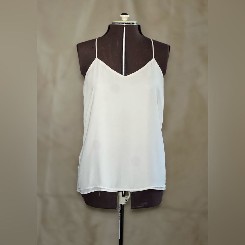 Express White sleeveless blouse.